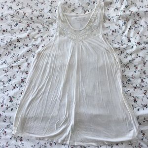 Cream tank top with lace accent